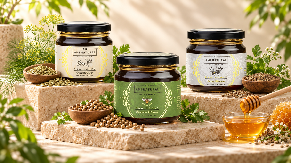Raw Honey Collection featuring three 400g jars with labels indicating fennel, coriander, and carom flavors surrounded by respective seeds and honeycomb
