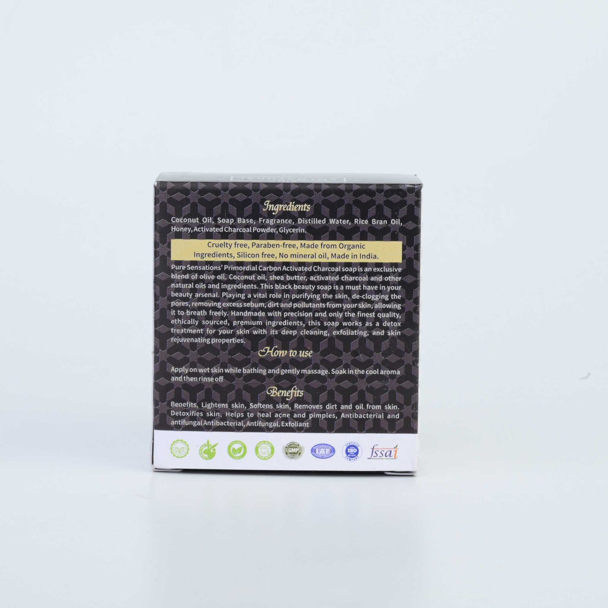 Ami Natural Activated Charcoal Soap box showing ingredients and benefits on a black patterned background with white and yellow text