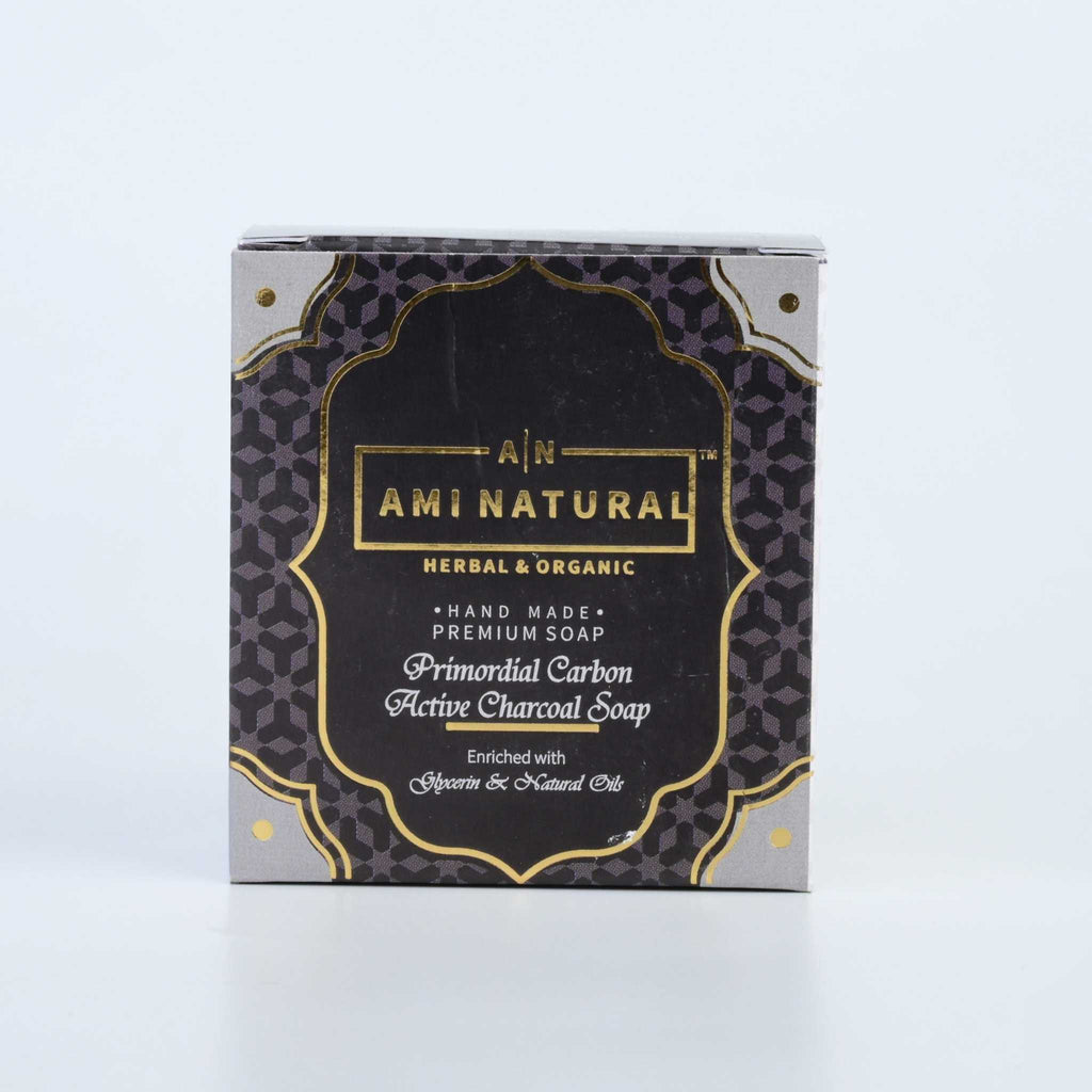 AMI NATURAL ACTIVATED CHARCOAL SOAP in black and gold packaging with herbal and organic label, handcrafted premium soap box