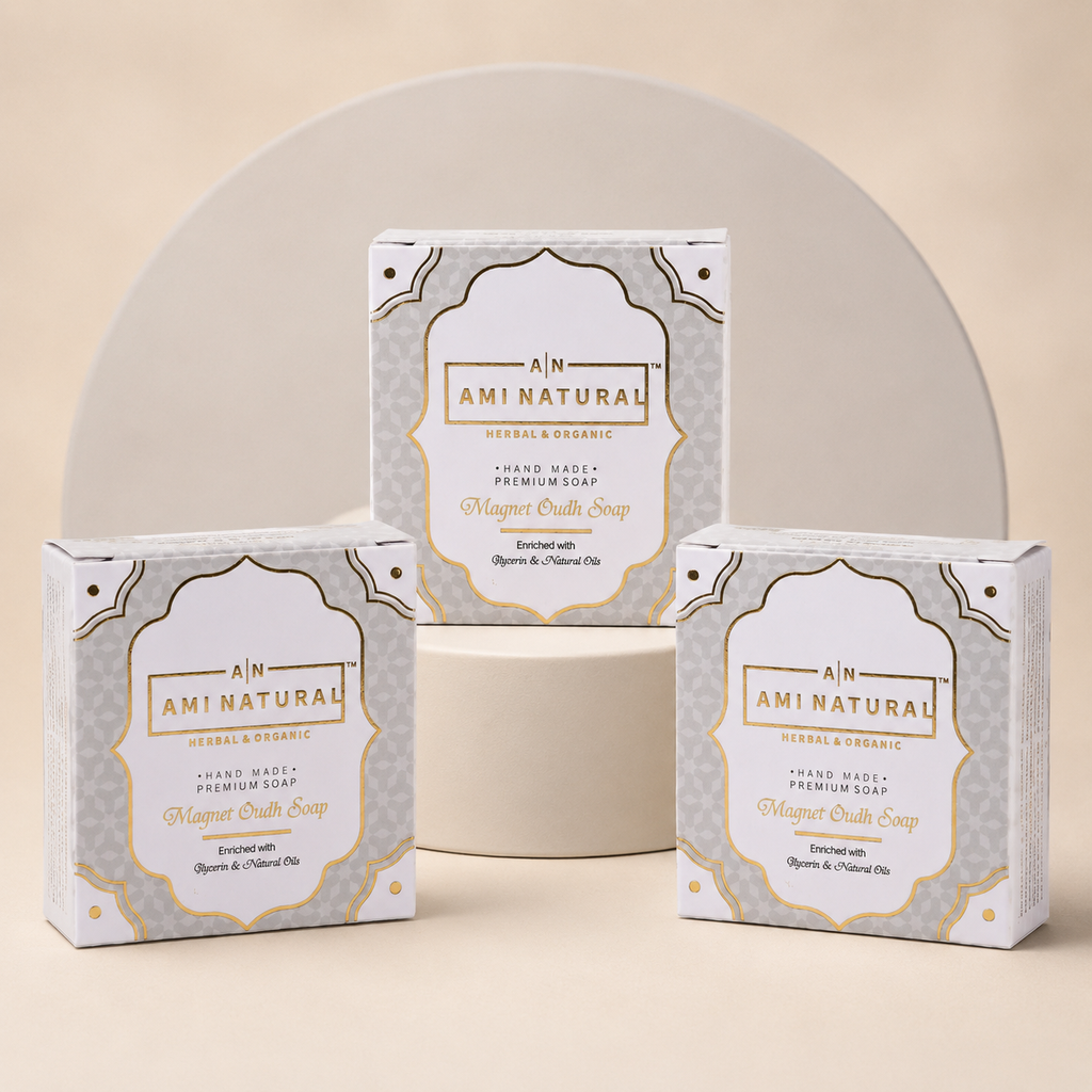 AMI NATURAL MAGNET OUDH SOAP pack of three with white and gold floral patterned boxes featuring elegant, premium branding design.